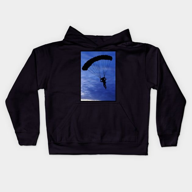 Parachuter Silhouette in Beautiful Blue Sky with a Black Border Kids Hoodie by Blue Butterfly Designs 